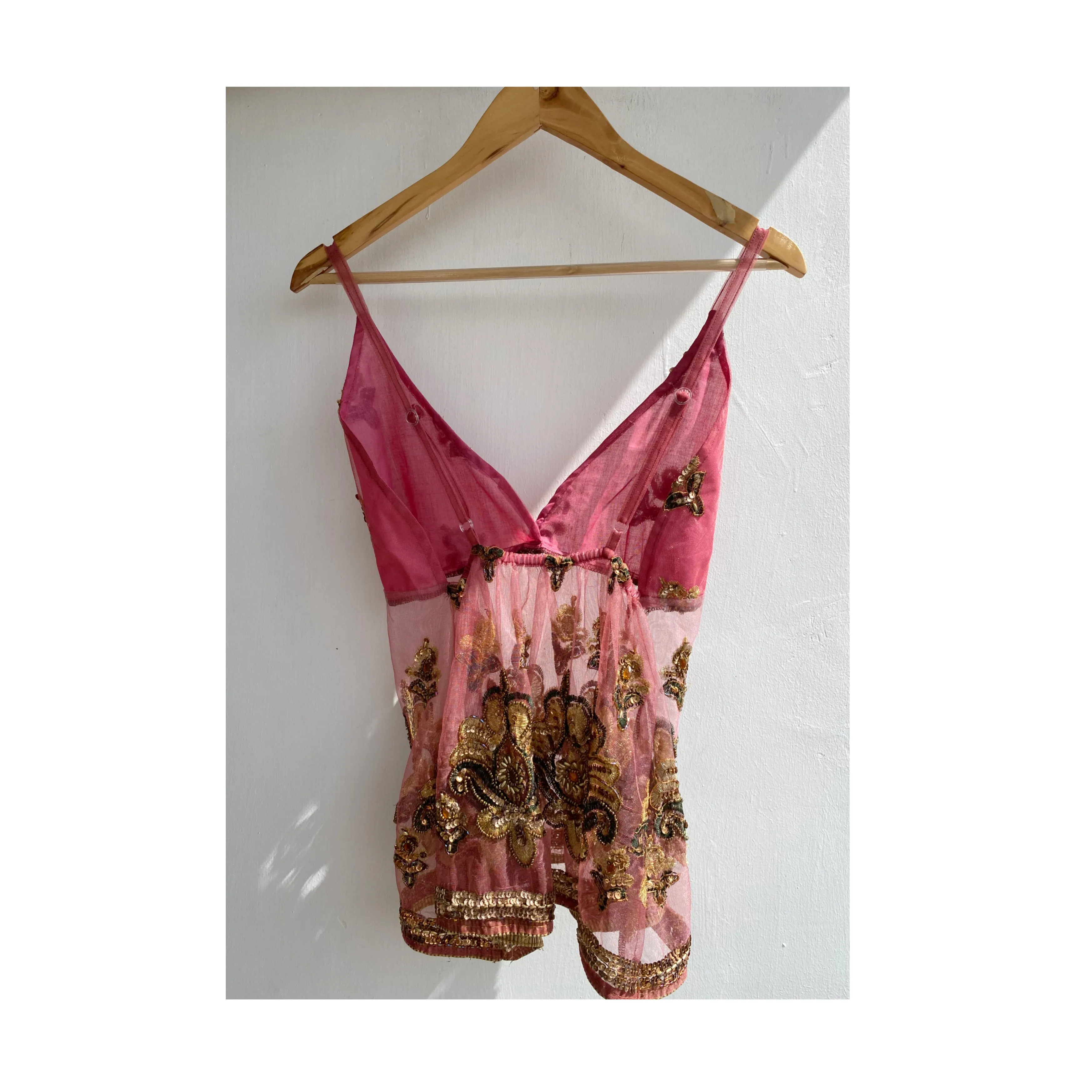 Peach embellished with sequins and beads